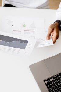 Close-up of someone viewing reports at a desk