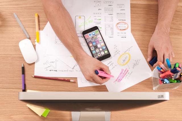 Overhead view of person working at a desk