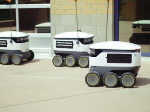 Three small robotics on wheels