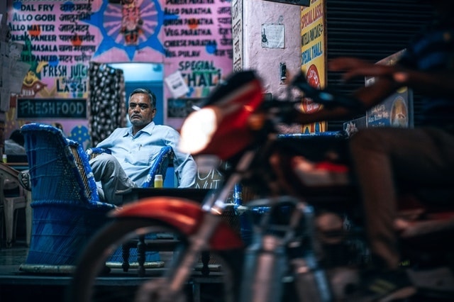 Working Capital Loan Man Sitting at Restaurant