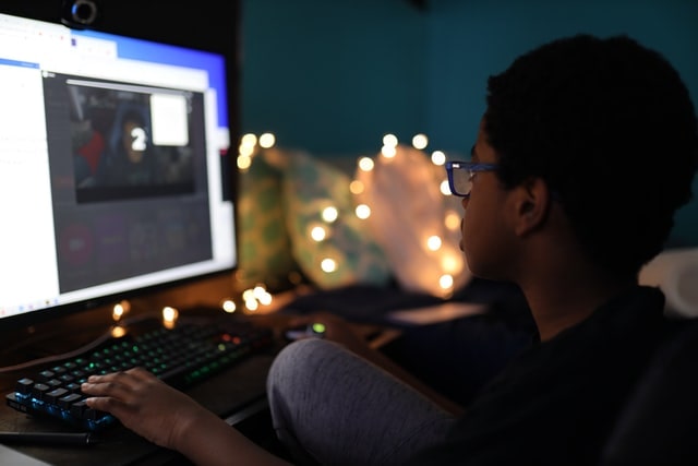 Young boy working at a computer