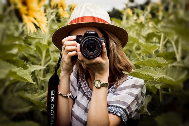 woman taking photos