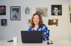 Catherine at her desk in the gallery