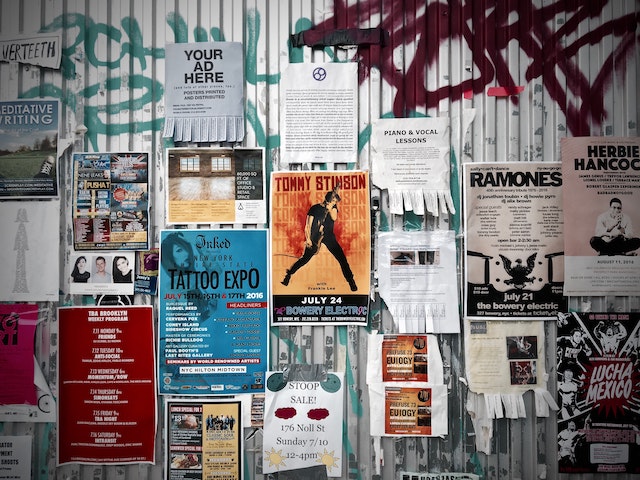 Exterior wall papered with flyers