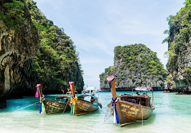 Three small boats moored in Phuket, Thailand