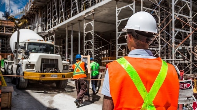 Workers on Construction Work Site