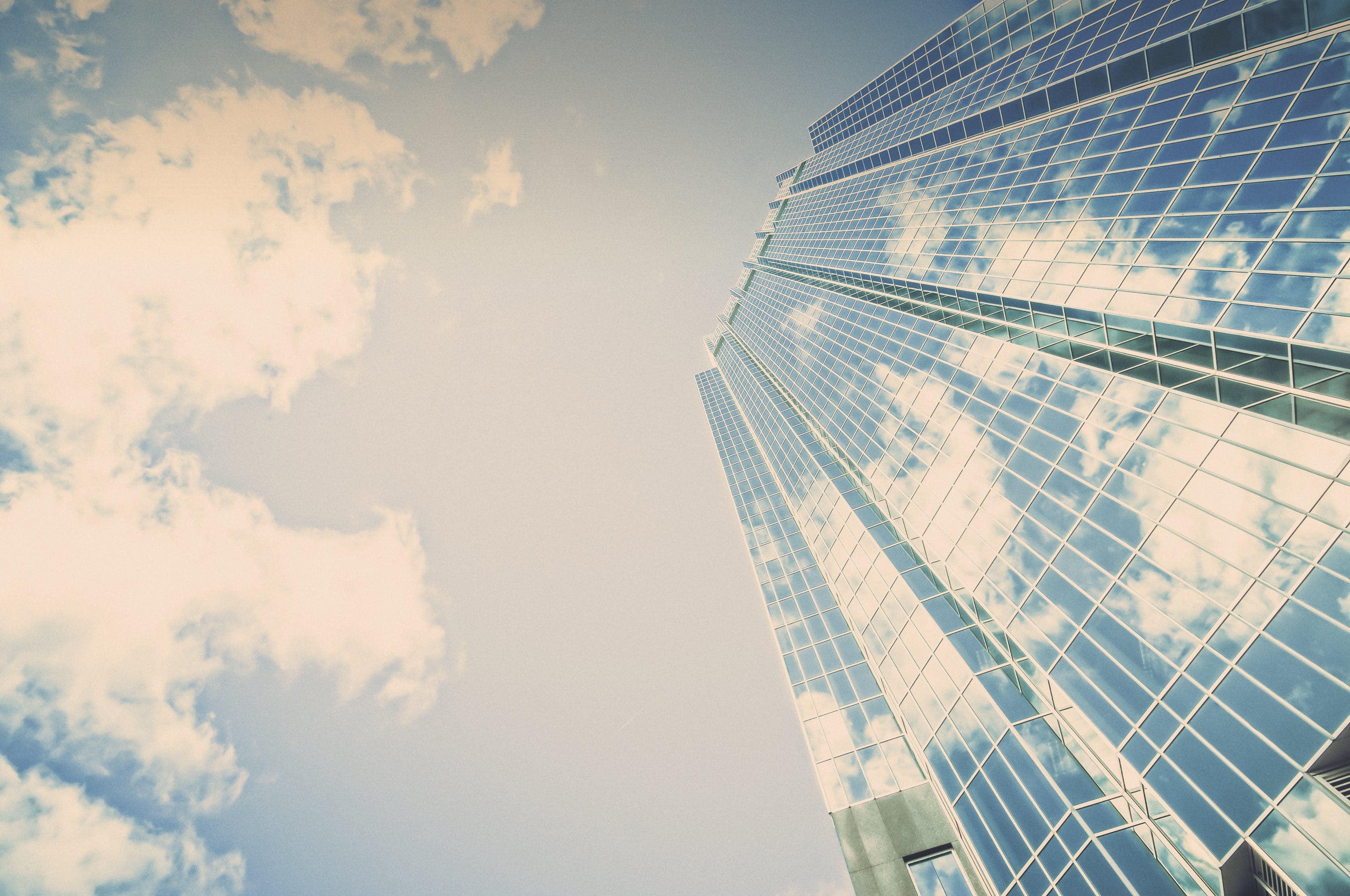 A tall building with glass windows