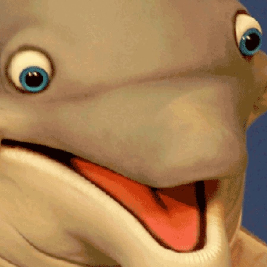 A cartoon dolphin with blue eyes