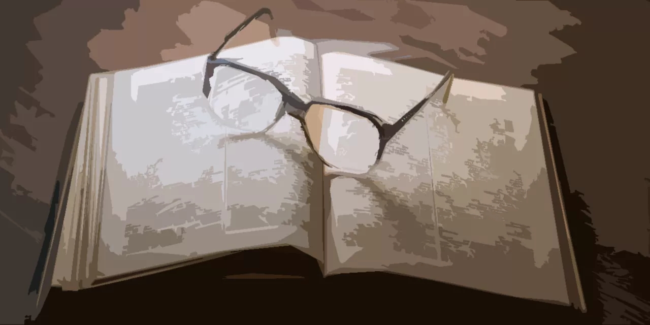 An illustration shows glasses resting on top of a book