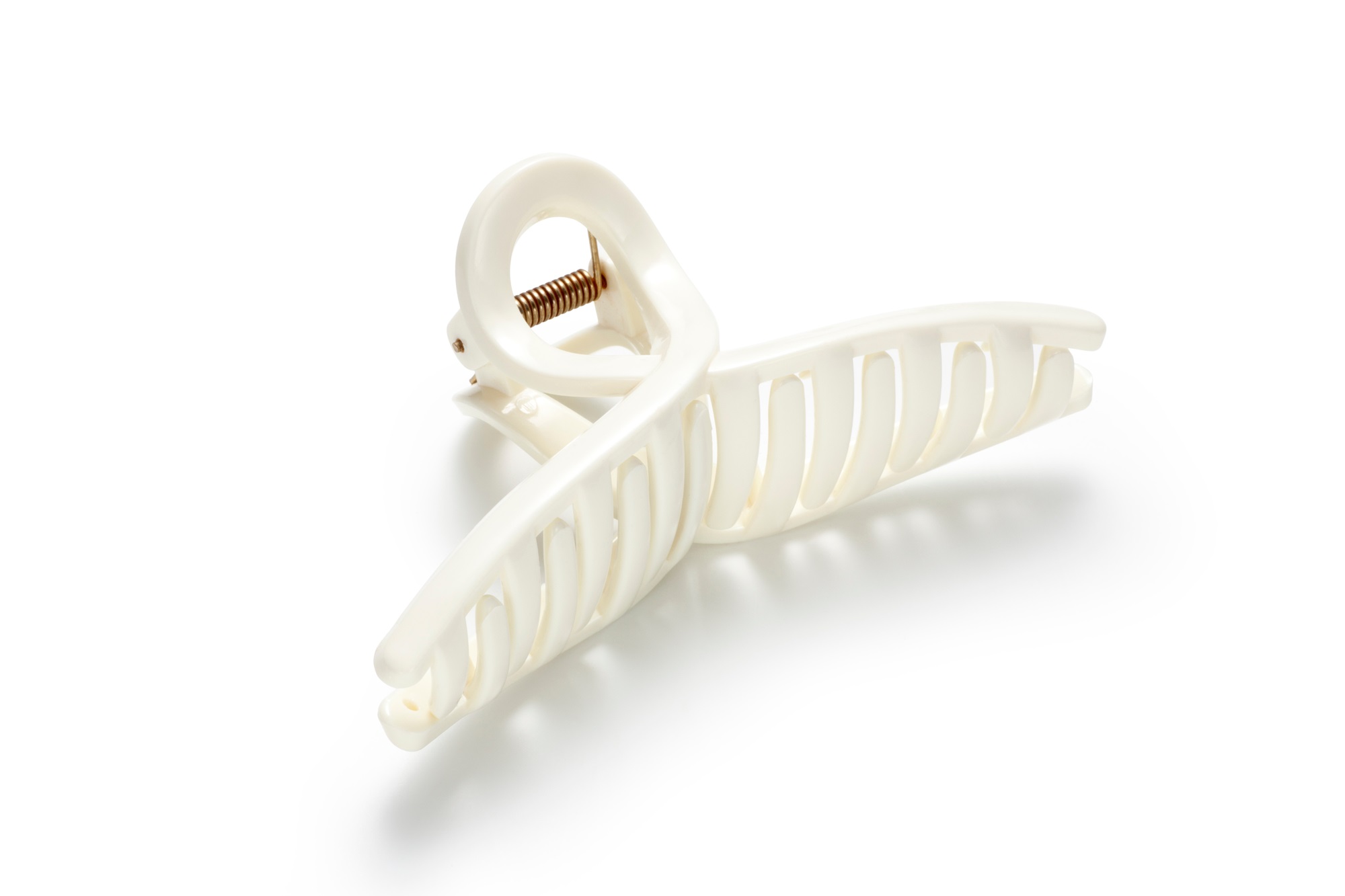 A plastic claw clip with a hinged clasp, isolated on a white background.