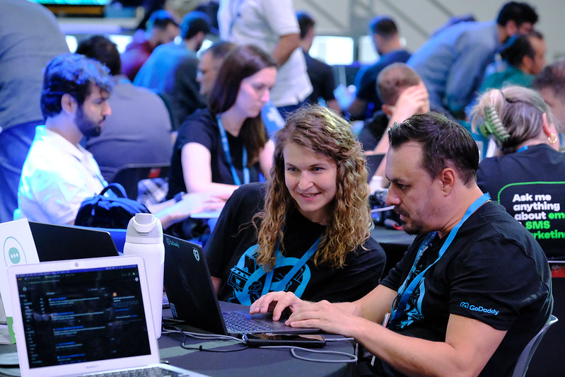 Alex and Jeff Anderson participate in the Marketing Team table at contributor day