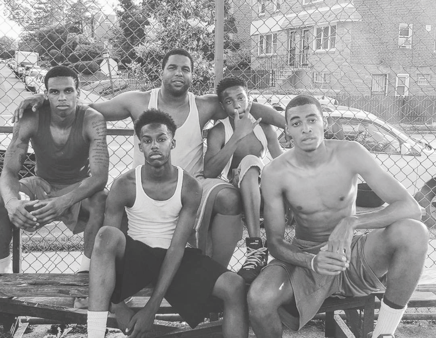 a group of men posing for a picture