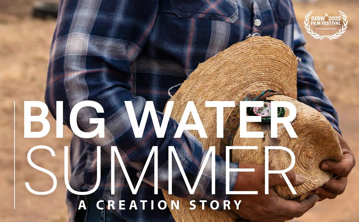 A close-up image of a person wearing a blue plaid shirt, holding a woven straw hat in their hands. The text overlay reads "Big Water Summer: A Creation Story" with the "SXSW 2022 Film Festival" laurel in the upper right corner.