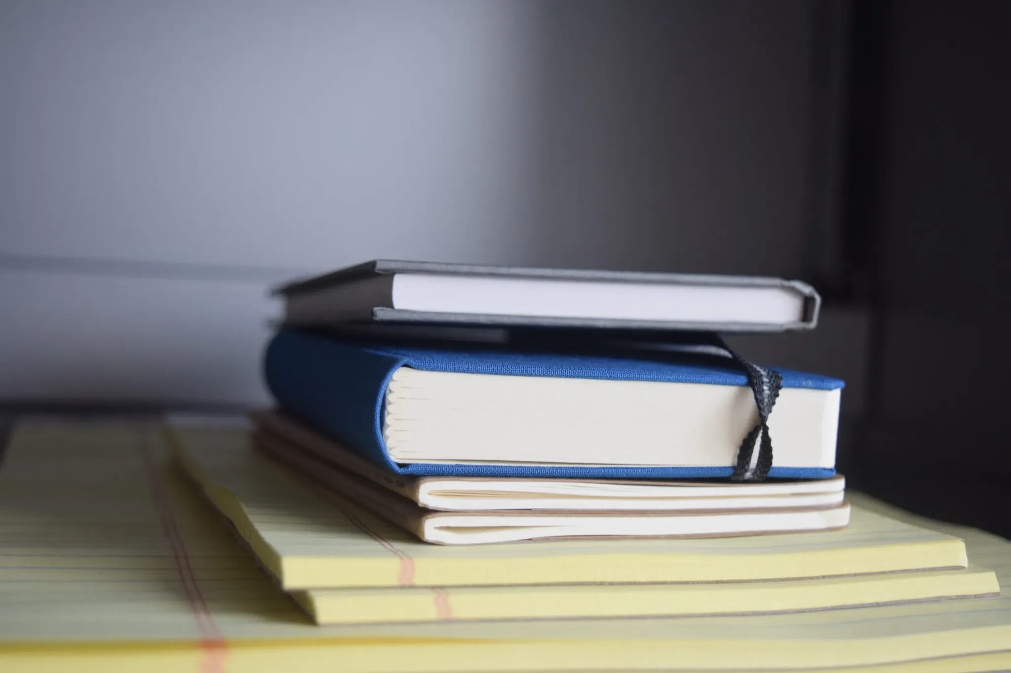 Stack of books and notebooks