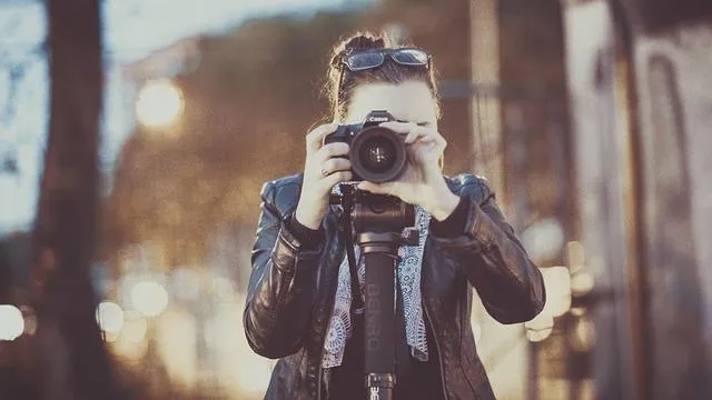 woman-taking-photos-business-name-ideas