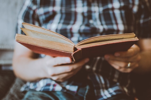 What Is A Media Kit Man Reading Book